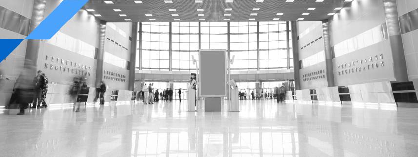 Background_Smart_Building_BG_03 Bright, modern lobby powered by LV-Tron, many people are passing by, and LV-Tron device is at the center, empowering the entire building.